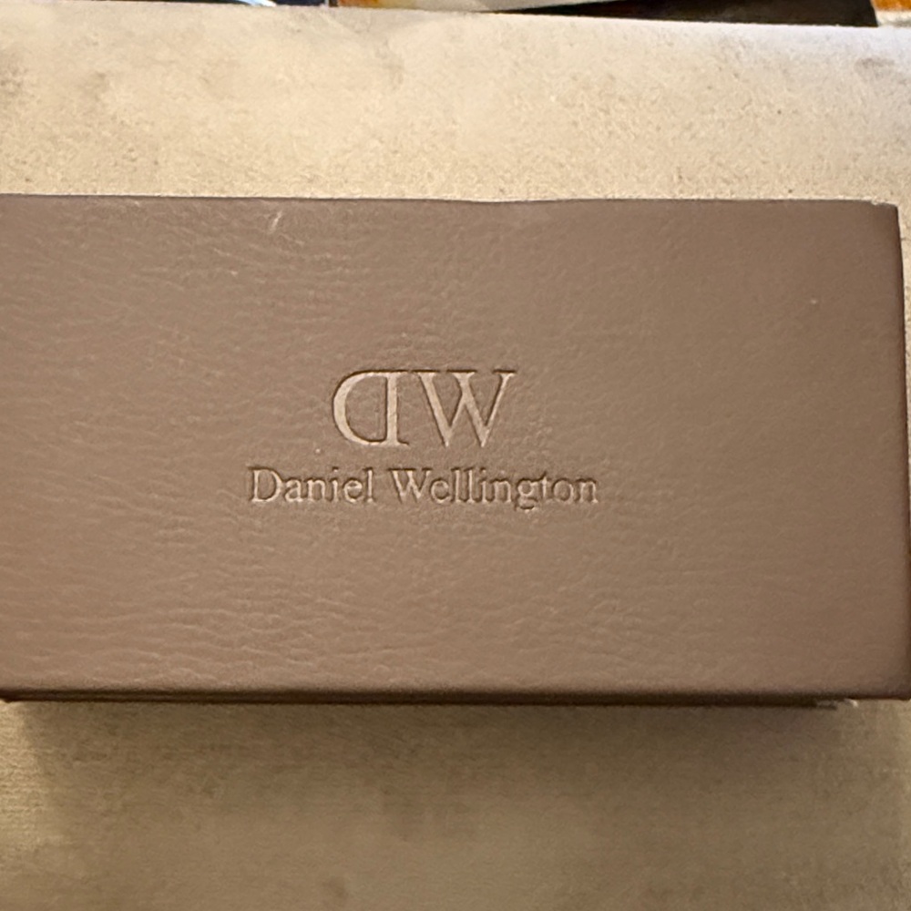 Brand new never used Daniel Wellington watch and box.